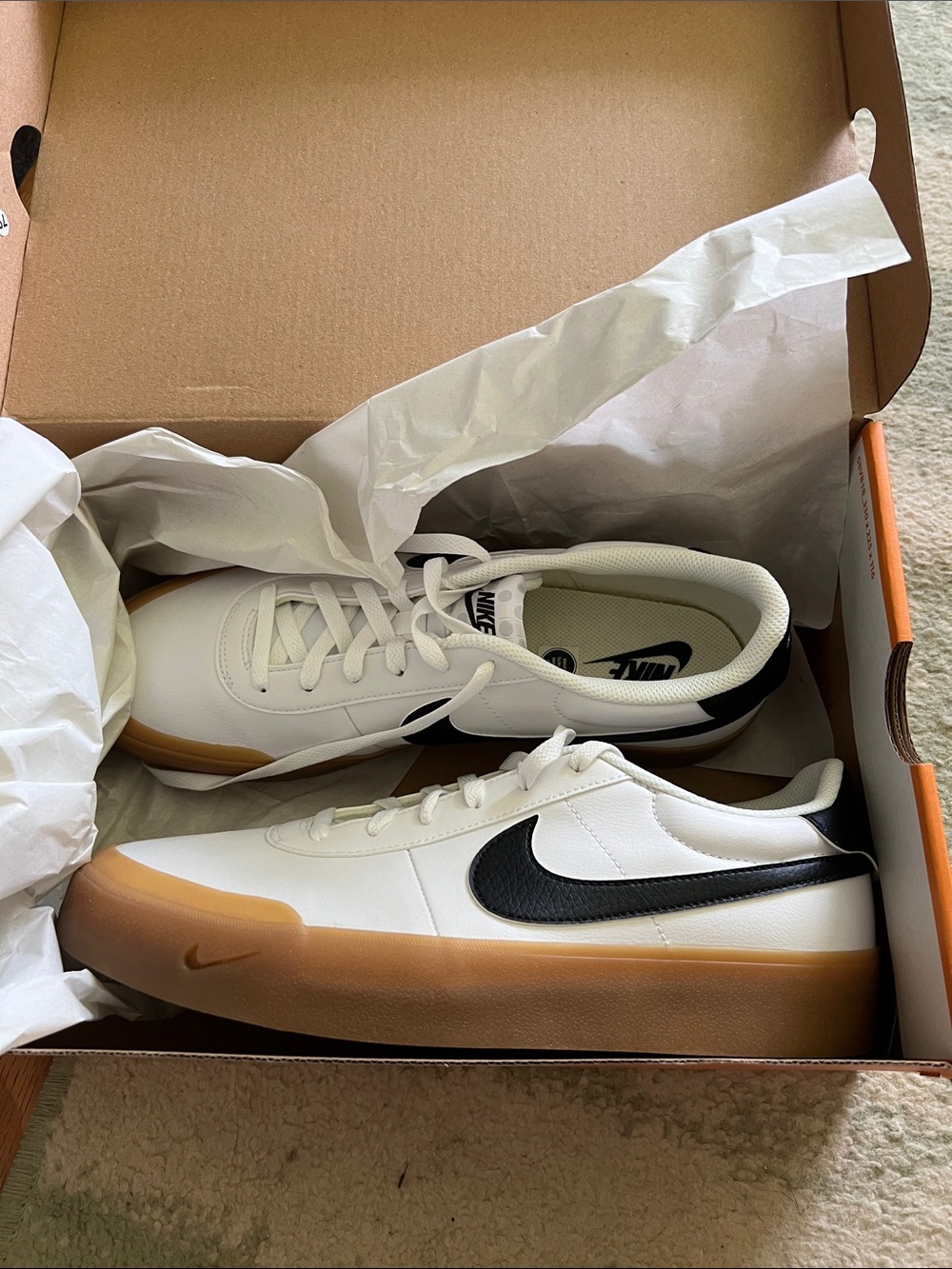Nike White Leather Sneakers with Black Swoosh and Gum Sole Low-Top